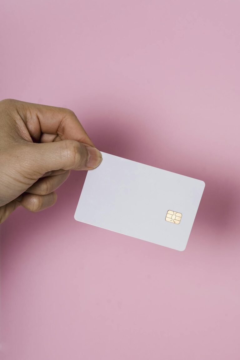 Person Holding a SIM Card 